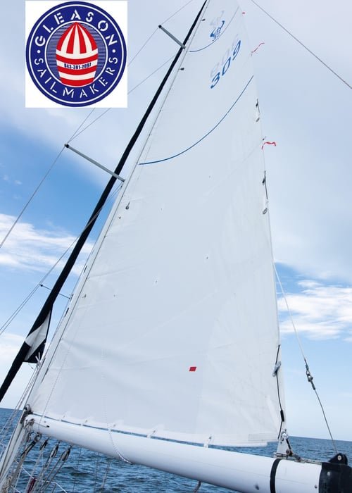 Custom Dacron replacement mainsail by Gary Gleason on an Ericson 32 – full mainsail view showing horizontal seam construction in premium Dacron sailcloth